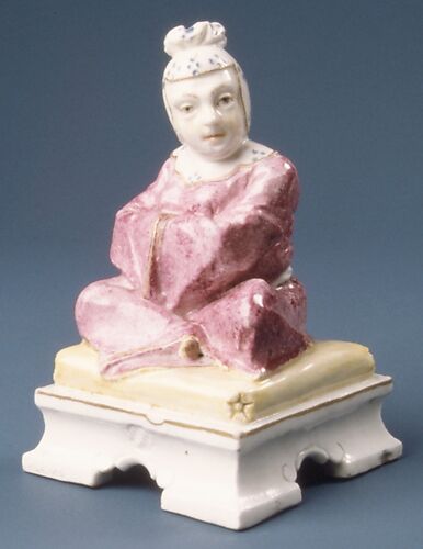 Figure of a seated Chinese woman