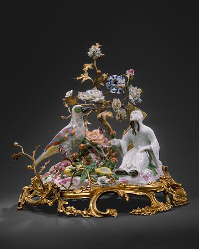 Chinese figure with bird