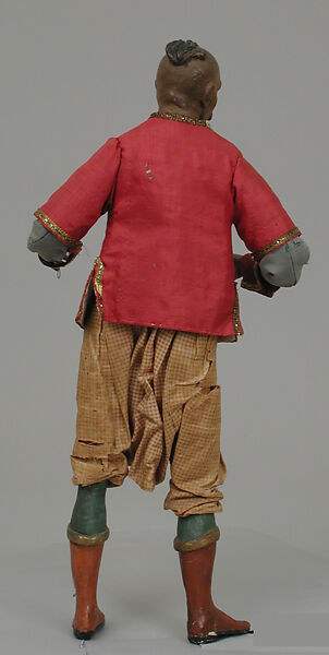 Oriental man, Polychromed terracotta head; wooden limbs; body of wire wrapped in tow; silk garments with metallic thread and other materials; glass eyes; silver scimitar, Italian, Naples