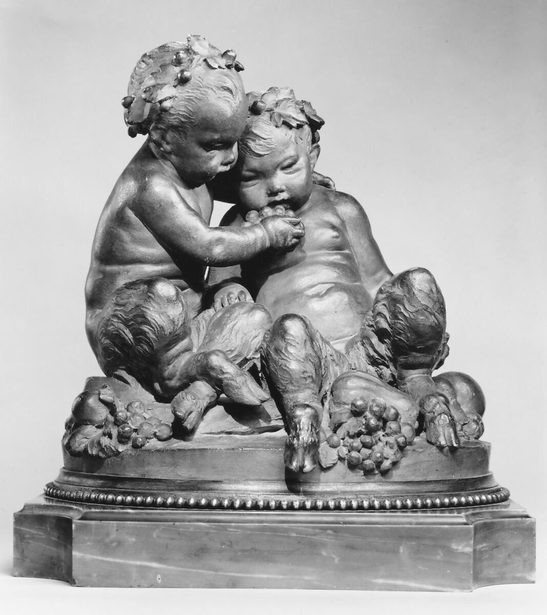 Infant satyrs with grapes, After a model by Louis Félix de La Rue (French, Paris 1731–1765 Paris), Terracotta (lacquered brown); base: gilt bronze and grey marble, French, Paris 