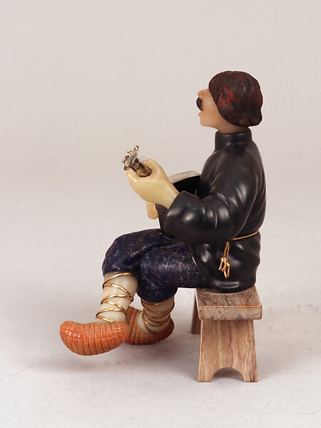 Balalaika player, Obsidian (probably), lapis lazuli, milk quartz and other colored semi-precious stones, two sapphires, silver and silver-gilt, Russian