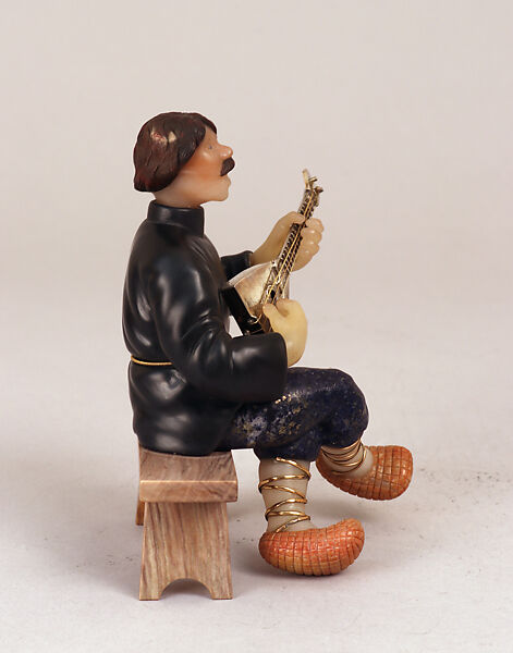 Balalaika player, Obsidian (probably), lapis lazuli, milk quartz and other colored semi-precious stones, two sapphires, silver and silver-gilt, Russian
