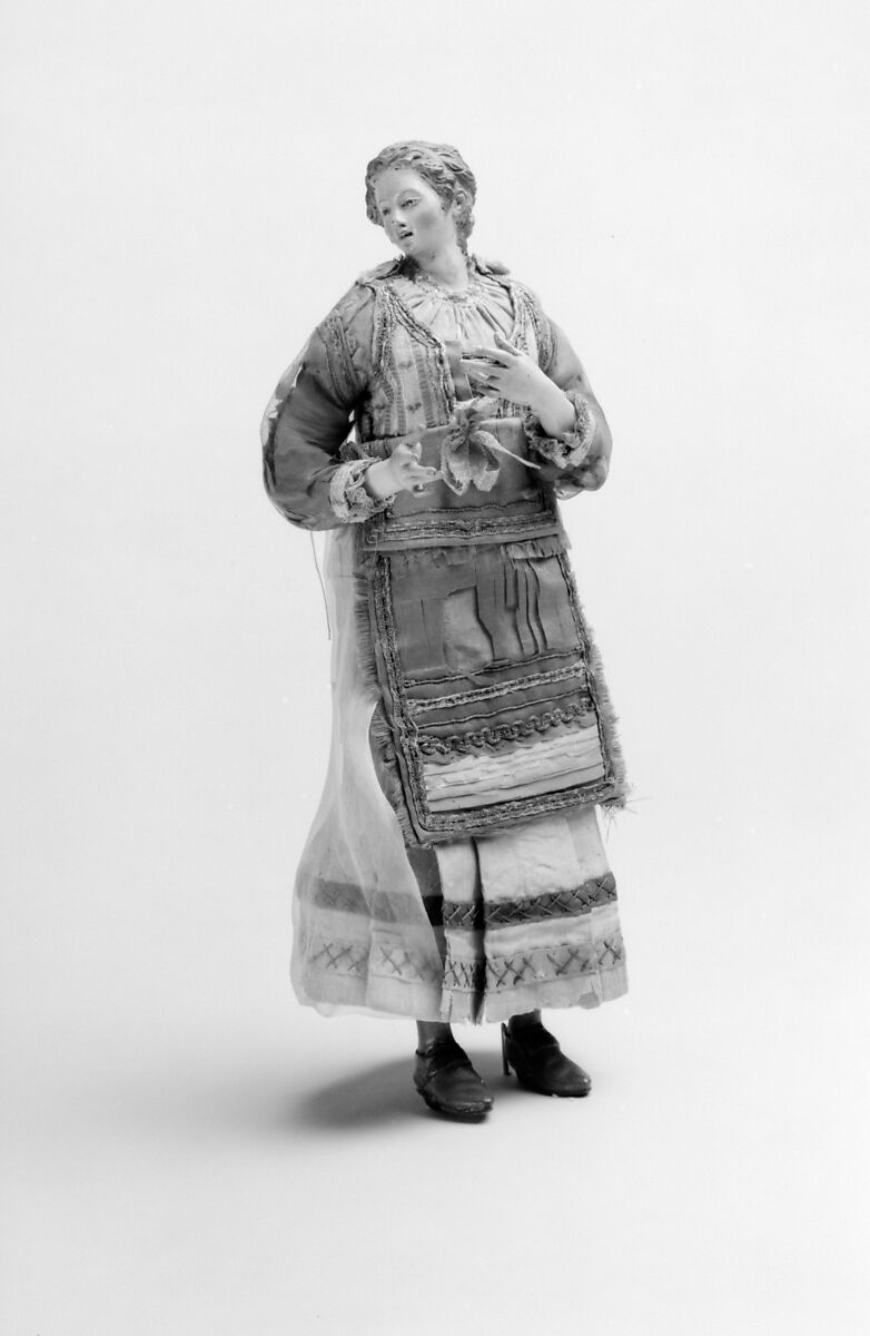 Standing woman in festival dress, Polychromed terracotta head; wooden limbs; body of wire wrapped in tow; silk and linen garments, Italian, Naples
