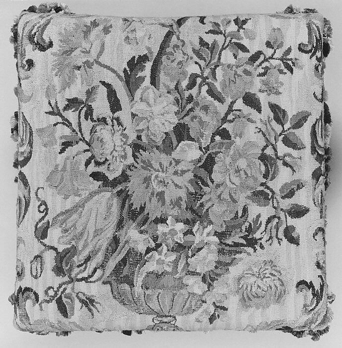 Four-legged stool, Carved and gilded walnut, covered in mid-18th century French tapestry with modern silk tasseled fringe, French