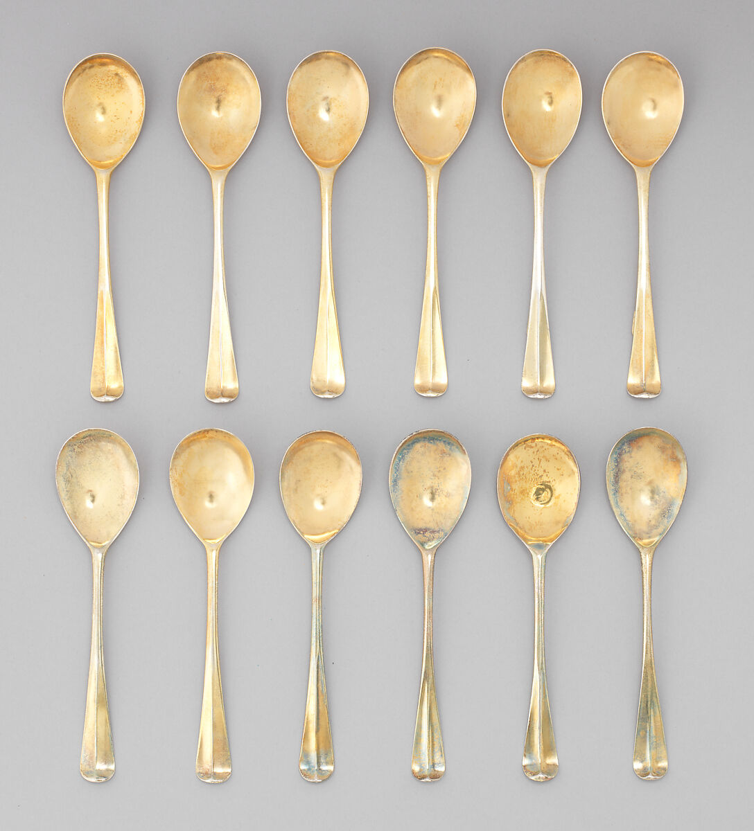 Six dessert spoons, Possibly by Christopher Skinner, Silver gilt, Irish, Dublin 