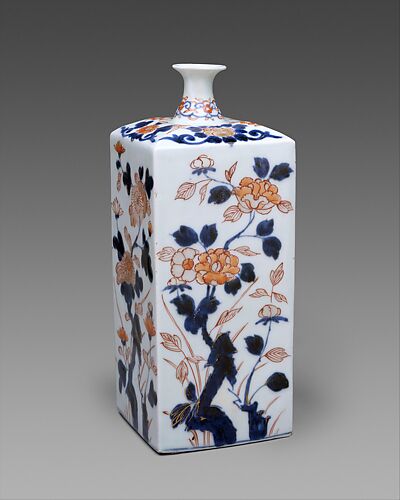 Bottle with flowers of the four seasons