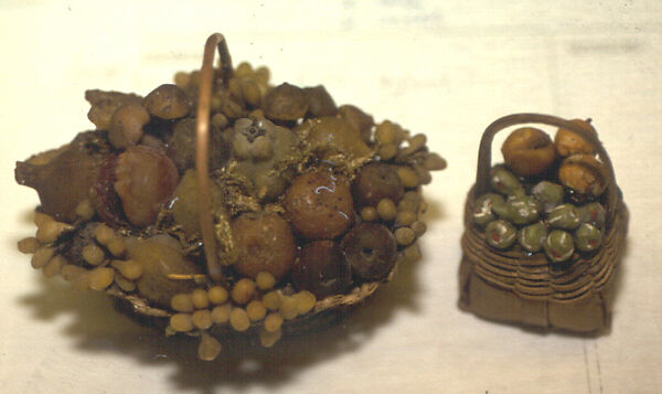 Small basket of fruit with handle