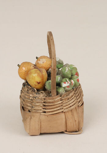 Small basket of fruit with handle