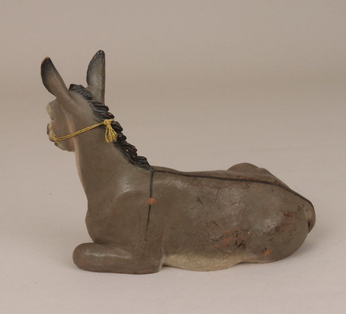Seated donkey, Polychromed terracotta, Italian, Naples
