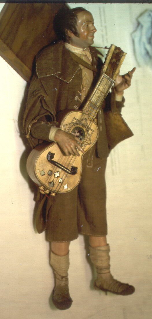Guitarist, Polychromed terracotta head and wooden limbs; body of wire wrapped in tow; cotton and leather garments; guitar of wood inlaid with shell (?), Italian, Naples
