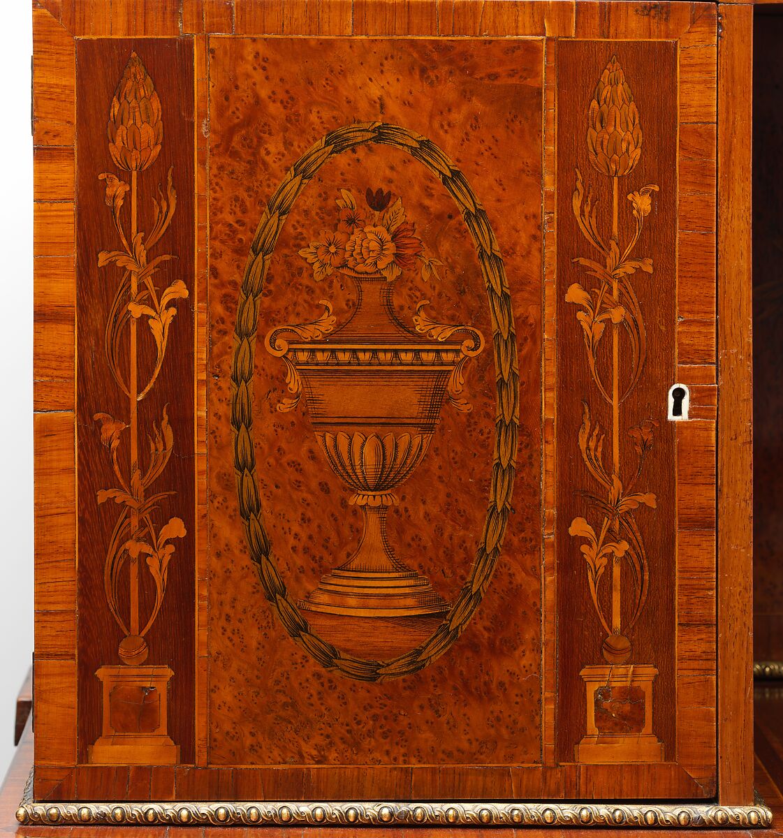 Desk (bonheur du jour), Wood, ivory, gilt bronze
Carcass woods:  mahogany and oak, with mahogany drawer linings
Veneer woods include satinwood, mahogany, yewwood,  tulipwood, rosewood, partridegewood (?), walnut, green-stained sycamore, and boxwood stringing, British