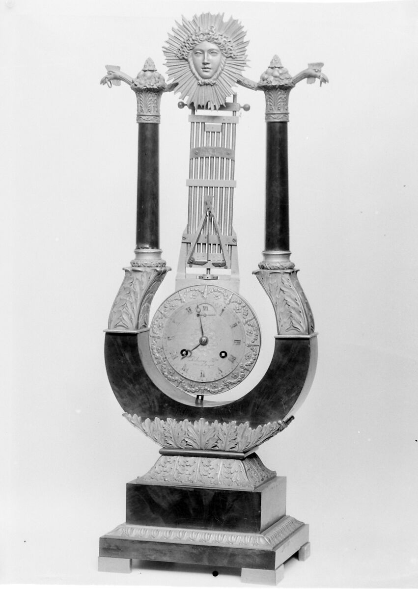 Clock in the form of an oscillating pendulum (pendule oscillante), Delaunoy (elève de Breguet), Gilt bronze, mahogany veneer, French 