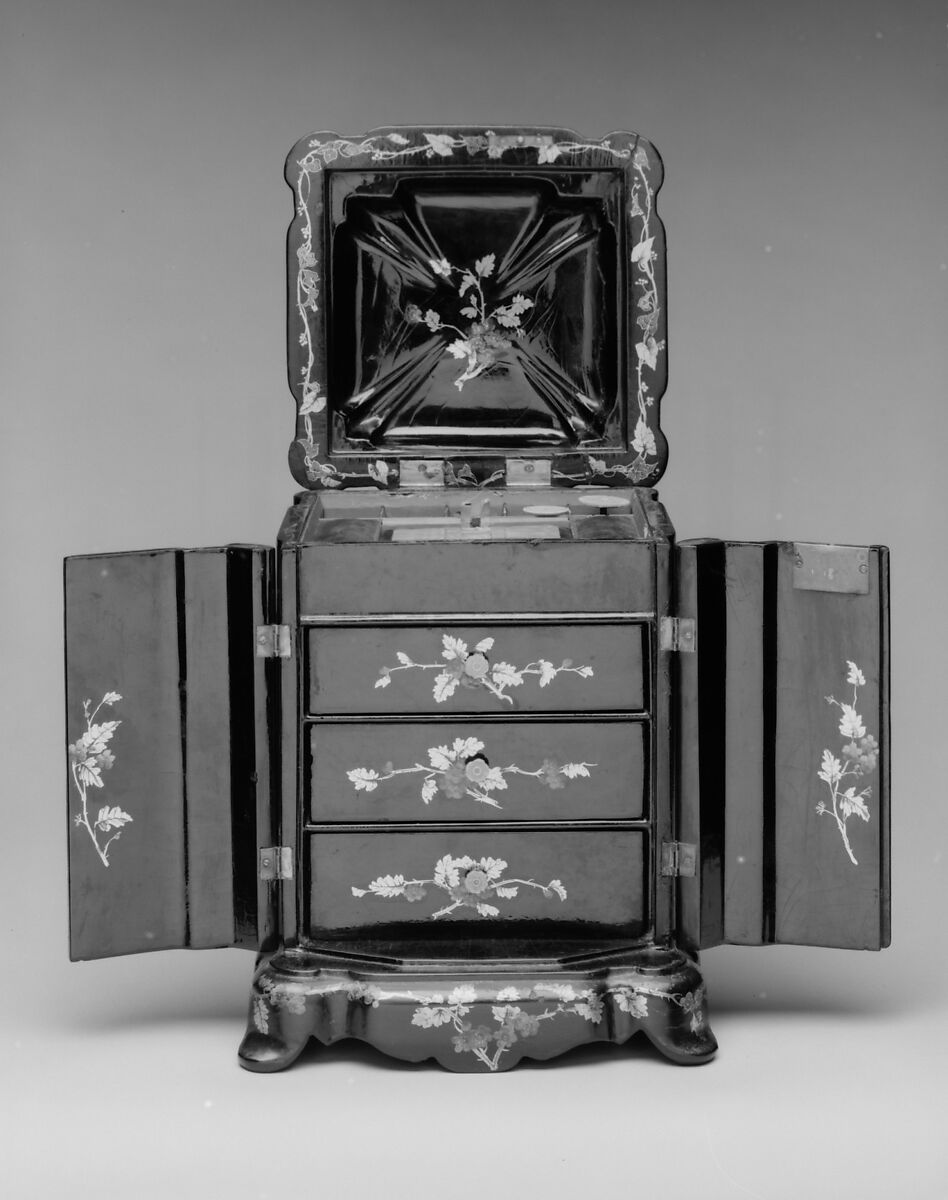 Small work and jewelry cabinet, Black lacquered, gilded and painted, papier-mâché, mother-of-pearl, silk velvet, and paper linings, British