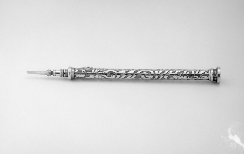 Pencil with eraser and lead holder (part of a set)