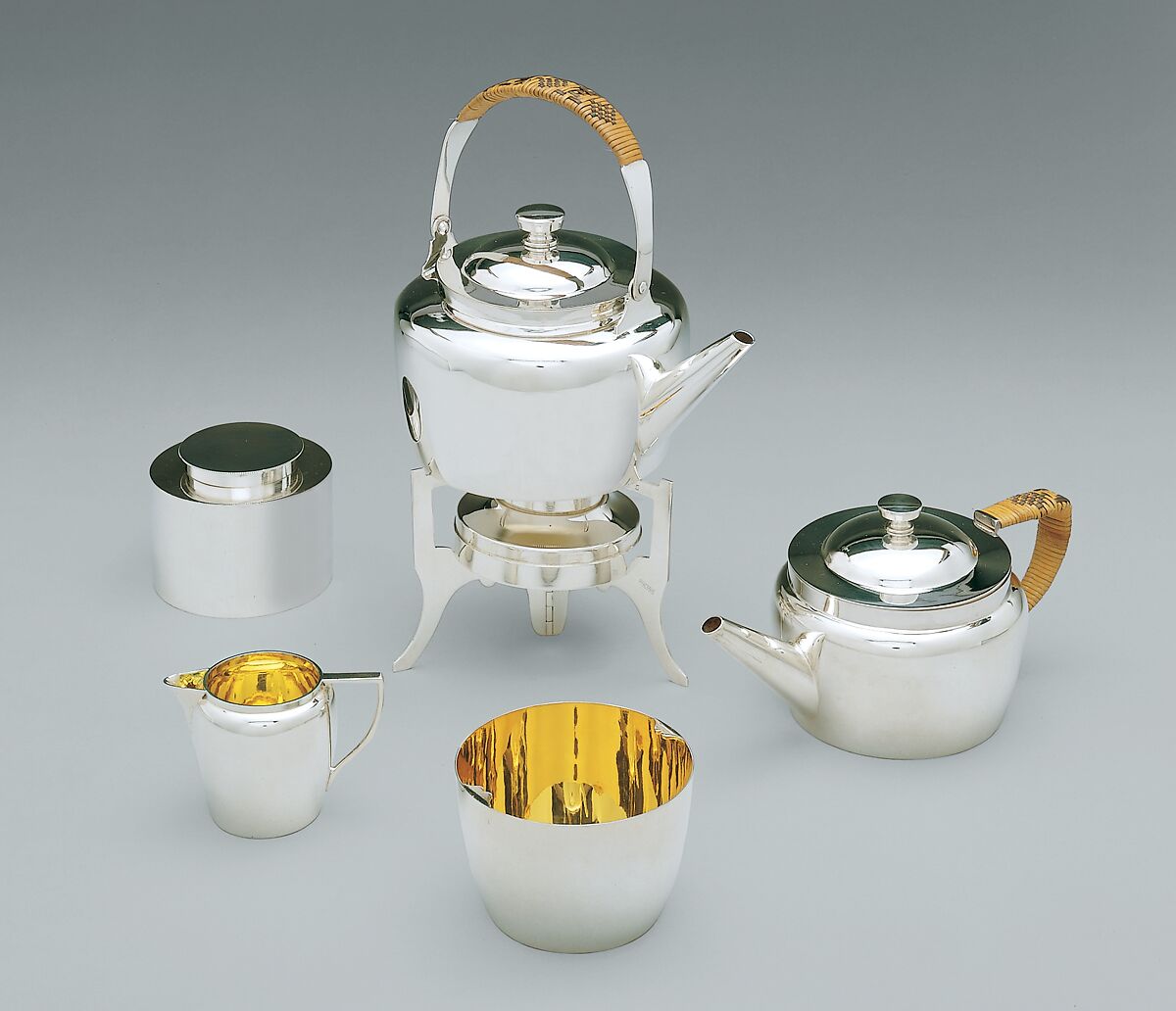 Traveling tea set, Christopher Dresser (British, Glasgow, Scotland 1834–1904 Mulhouse), Gilt and silver-plated brass; split bamboo; leather covered wood with velvet on the underside and glazed cotton linings, British, Birmingham 
