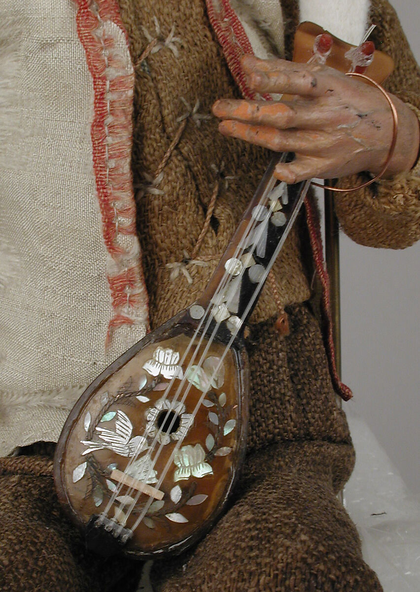 Man with mandolin, Polychromed terracotta head and wooden limbs; body of wire wrapped in tow; silk and linen garments; wood mandolin, Italian, Naples