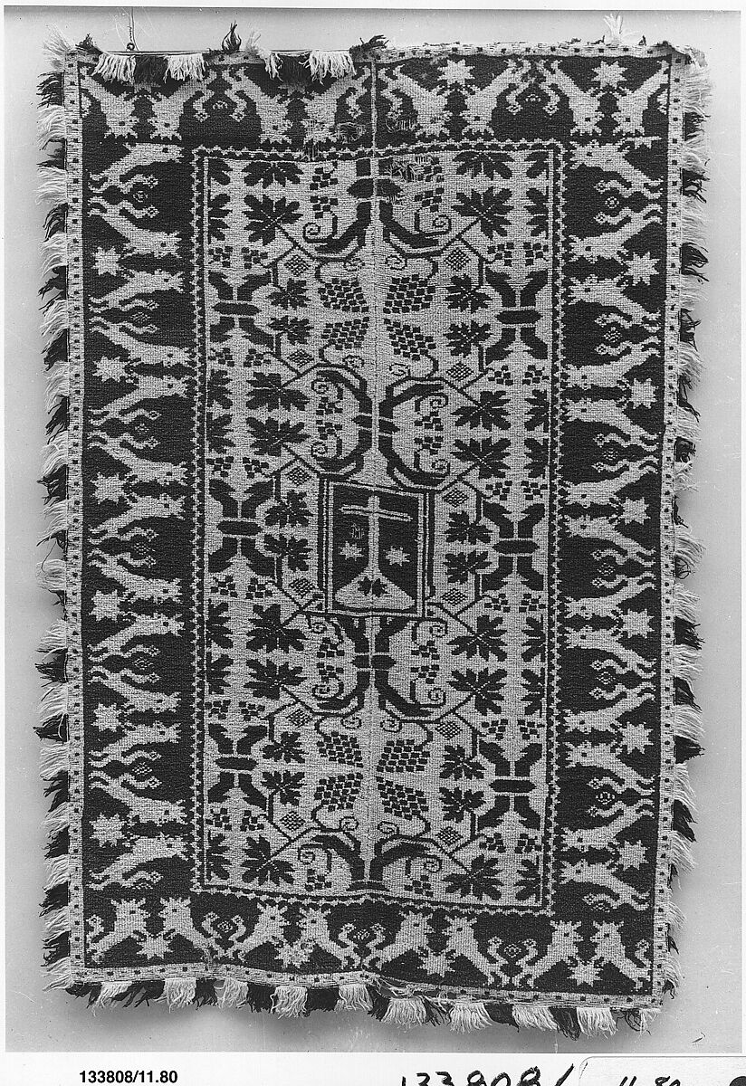 Rug with Carmelite Order coat-of-arms, Cotton foundation warp and weft, wool supplementary weft; weft loop pile weave, Spanish 