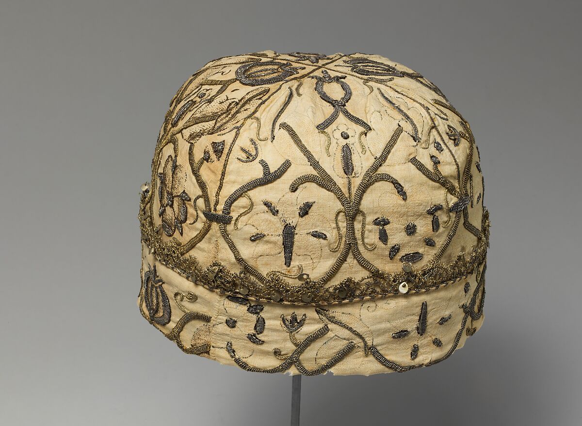 Night cap, Linen worked with silk and metal thread, spangles; speckling, running, outline, and plaited braid stitches; metal bobbin lace, British