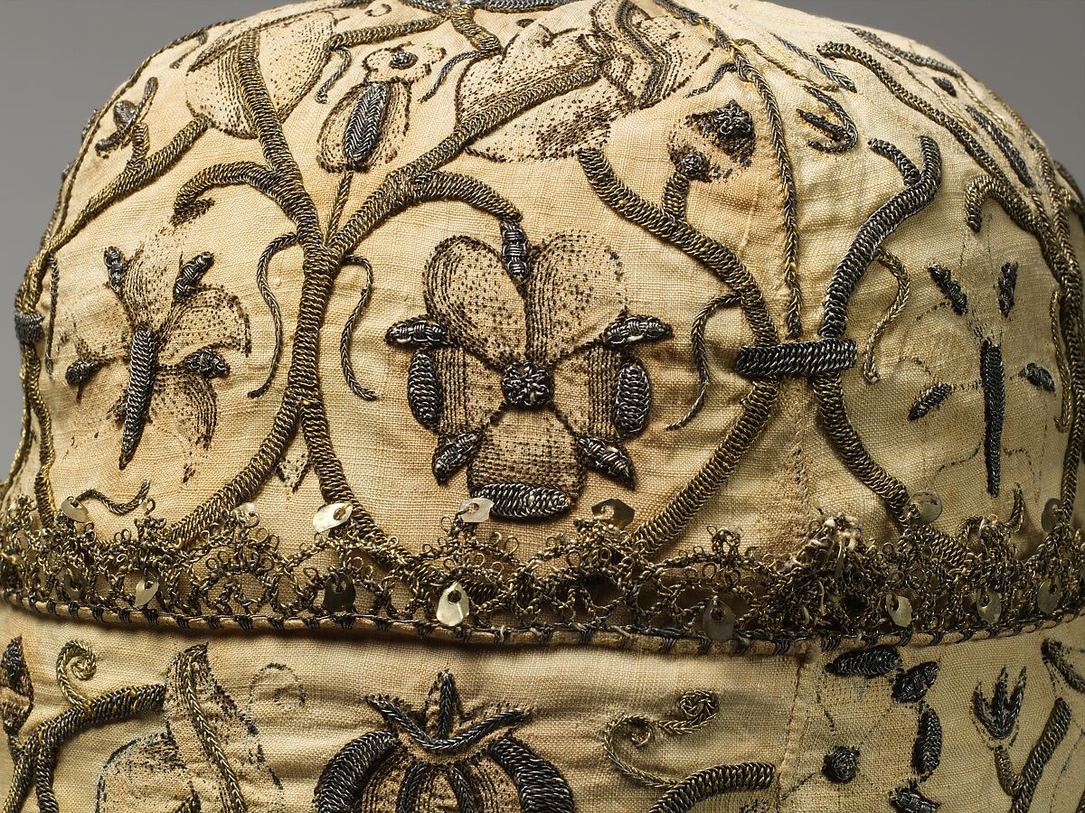 Night cap, Linen worked with silk and metal thread, spangles; speckling, running, outline, and plaited braid stitches; metal bobbin lace, British
