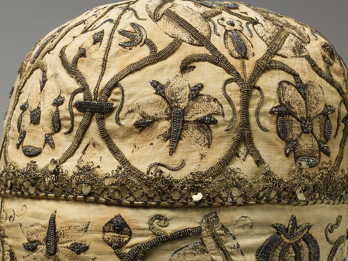 Night cap, Linen worked with silk and metal thread, spangles; speckling, running, outline, and plaited braid stitches; metal bobbin lace, British