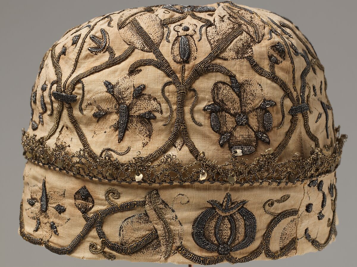 Night cap, Linen worked with silk and metal thread, spangles; speckling, running, outline, and plaited braid stitches; metal bobbin lace, British