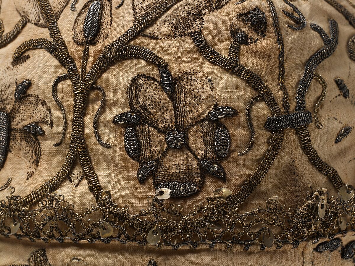 Night cap, Linen worked with silk and metal thread, spangles; speckling, running, outline, and plaited braid stitches; metal bobbin lace, British