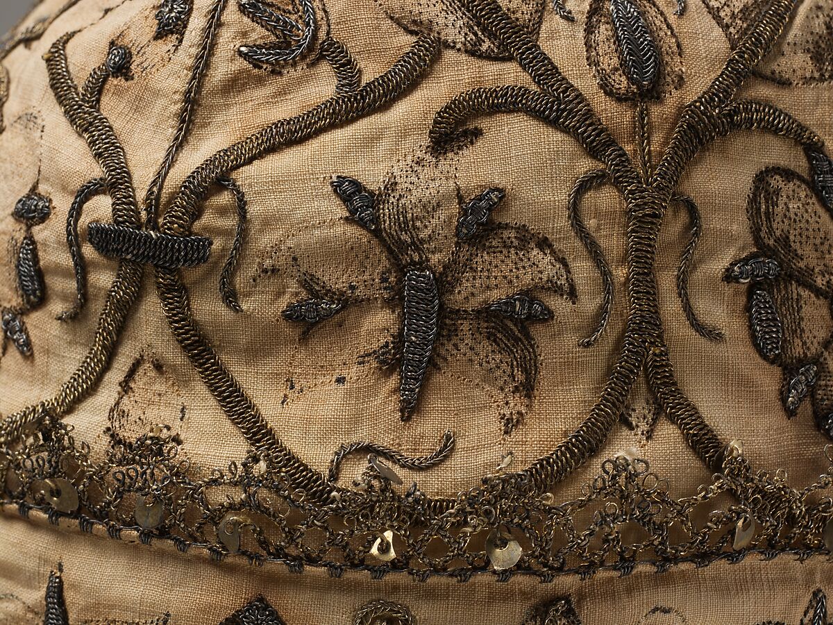 Night cap, Linen worked with silk and metal thread, spangles; speckling, running, outline, and plaited braid stitches; metal bobbin lace, British