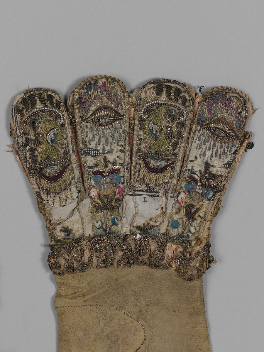 Pair of gloves, Leather, satin worked with silk and precious metal thread, seed pearls; satin, couching, and darning stitches; metal bobbin lace; paper, British