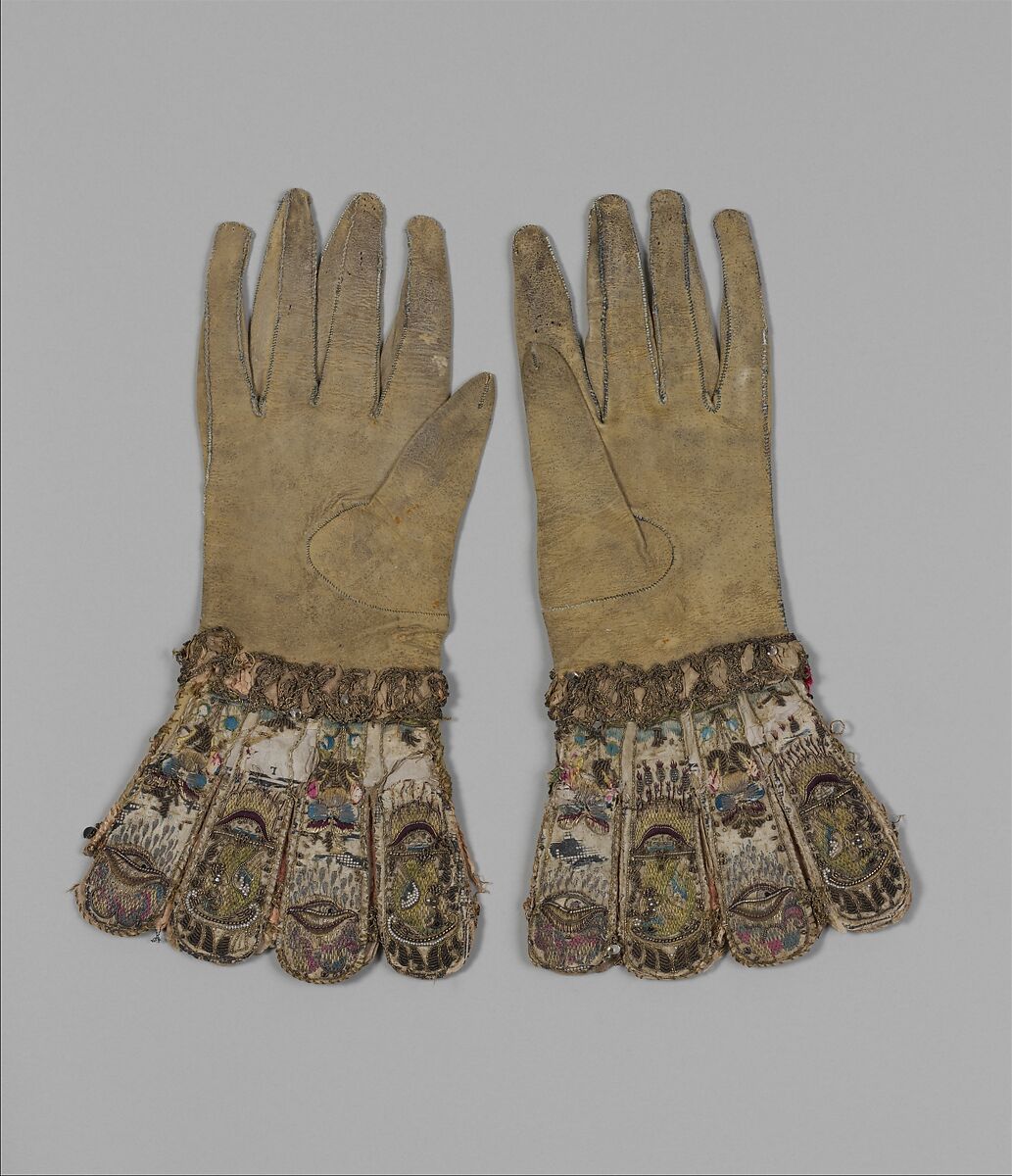 Pair of gloves, Leather, satin worked with silk and precious metal thread, seed pearls; satin, couching, and darning stitches; metal bobbin lace; paper, British