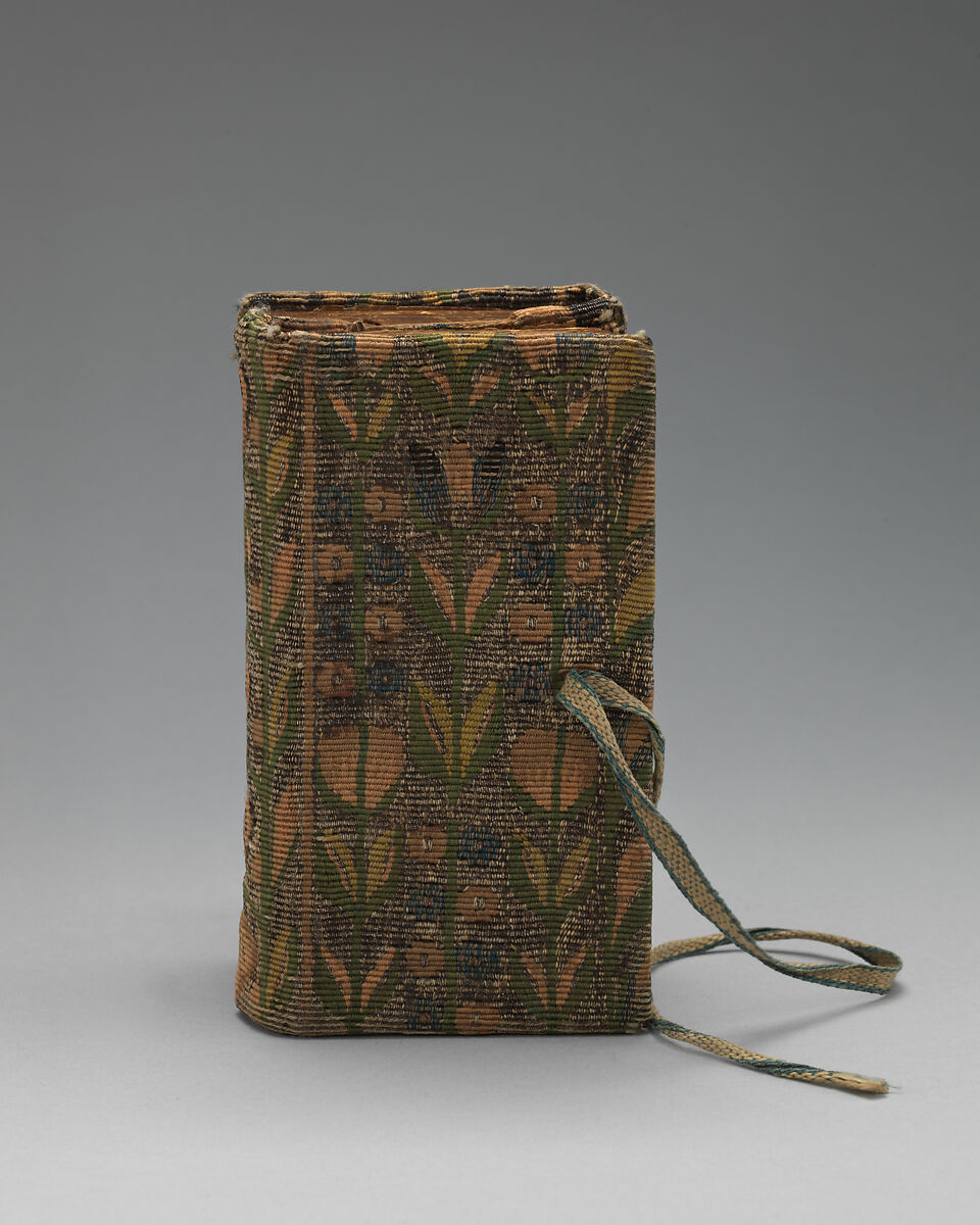 Bookbinding of repeat foliate pattern, Attributed to the weaving workshop funded by William Sheldon (Barcheston, Warwickshire and Bordesley, Worcestershire), Wool, silk, silver-metal-wrapped thread, containing a seventeenth-century printed book, British, possibly Barcheston or Bordesley 