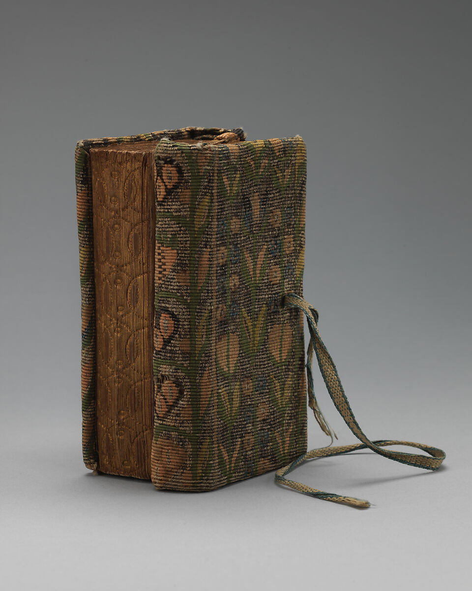 Bookbinding of repeat foliate pattern, Attributed to the weaving workshop funded by William Sheldon (Barcheston, Warwickshire and Bordesley, Worcestershire), Wool, silk, silver-metal-wrapped thread, containing a seventeenth-century printed book, British, possibly Barcheston or Bordesley