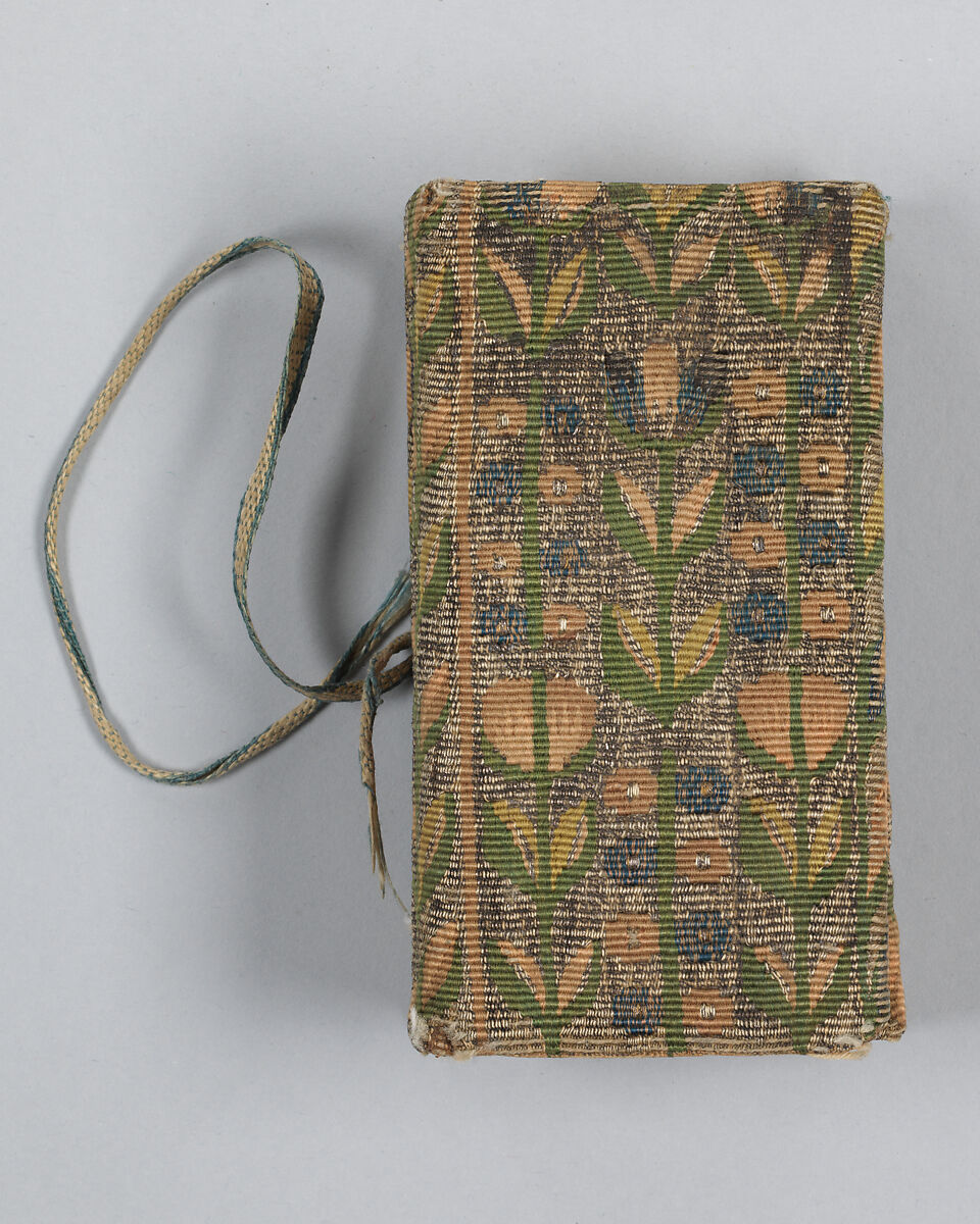 Bookbinding of repeat foliate pattern, Attributed to the weaving workshop funded by William Sheldon (Barcheston, Warwickshire and Bordesley, Worcestershire), Wool, silk, silver-metal-wrapped thread, containing a seventeenth-century printed book, British, possibly Barcheston or Bordesley