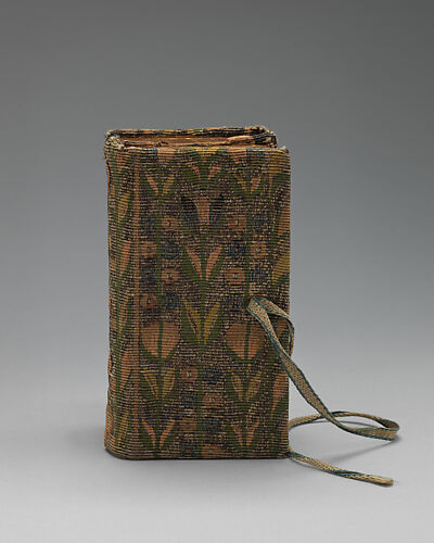 Bookbinding of repeat foliate pattern