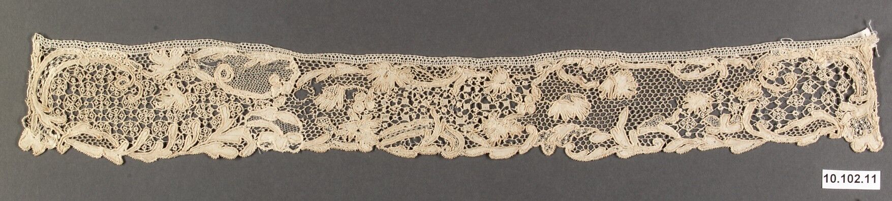 Piece of needle lace (one of a pair)