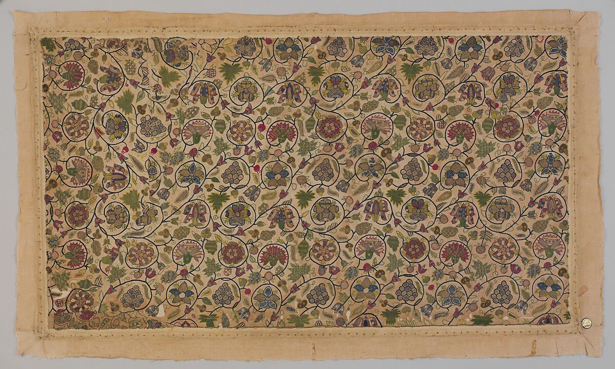 Cushion cover, Linen embroidered with silk and gilded silver thread; chain, square double chain, stem,
plaited braid, and buttonhole stitches, with buttonhole fillings, laid and couched work, British