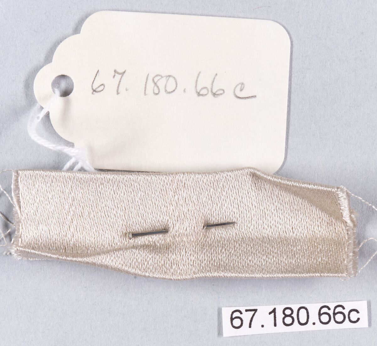 Sample book, page from a sample book and loose samples (in envelope), British