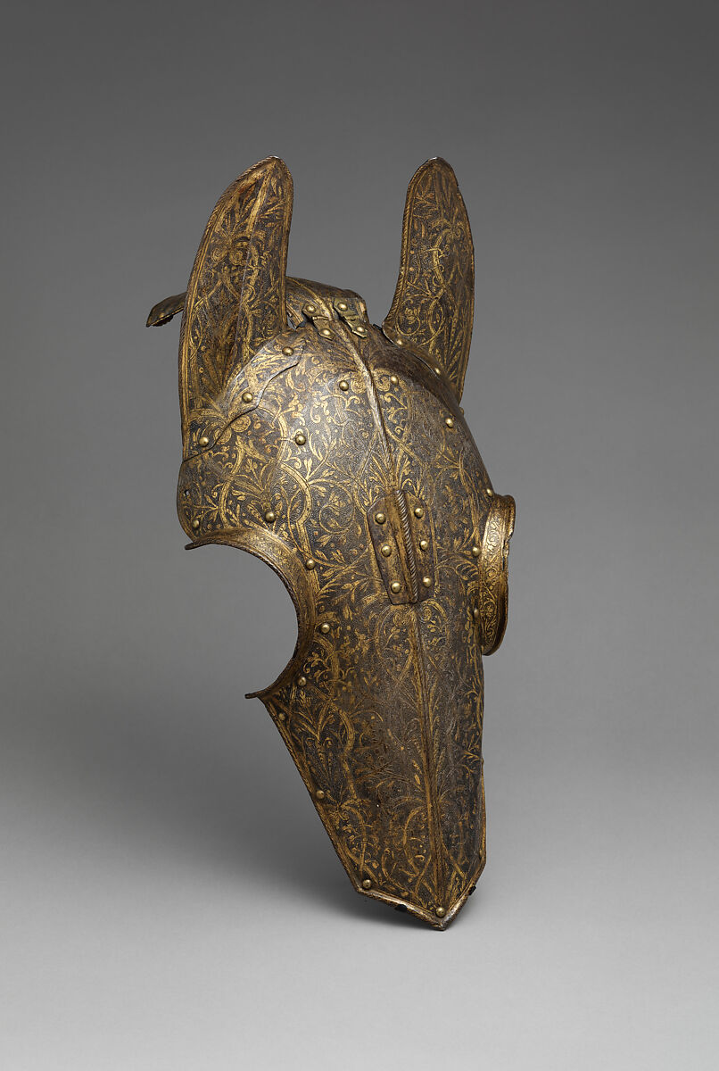 Demi-Chanfron, c. 1550. The chanfron, head defense for a horse, was  introduced in the 1300s. It included two side pieces to protect the cheeks.  In the 16th and 17th centuries, when armor