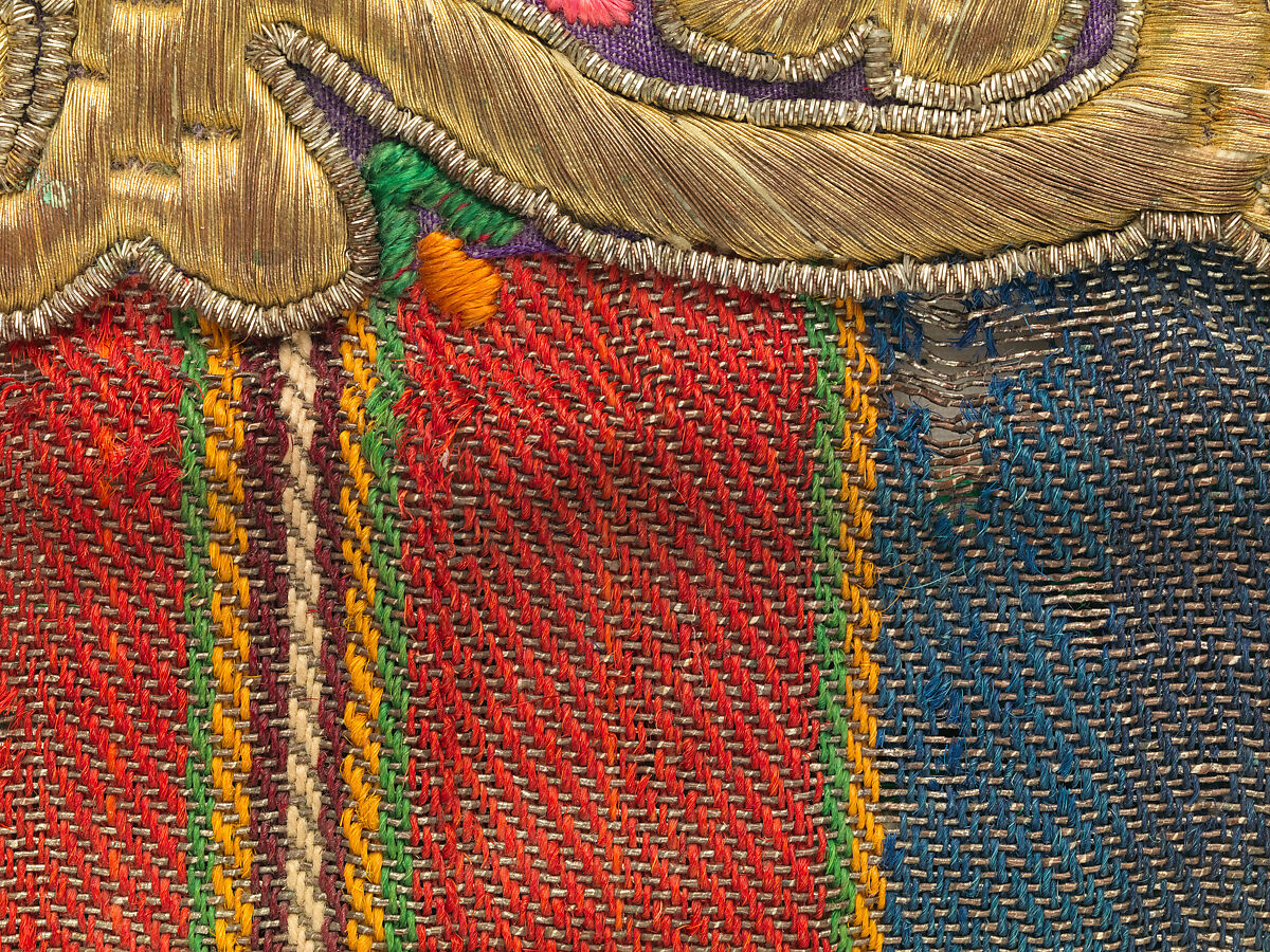 Fragment from an apron (opreg cu ciucuri), Background: twill weave (warp: Turcana wool, Z spun, 24 per cm; weft: metal-wrapped thread; wool, Z spun, 14 per cm; cotton, 2Z spun, S plied); decorative panel: tapestry weave (warp: cotton, 2Z spun, S pliz, 16 per cm; weft: linen, Z spun, 38 per cm; silk, 2Z spun, S plied; metal-wrapped thread, 64 per cm); embroidery: metal-wrapped thread, metal coil, Romanian, Banat area