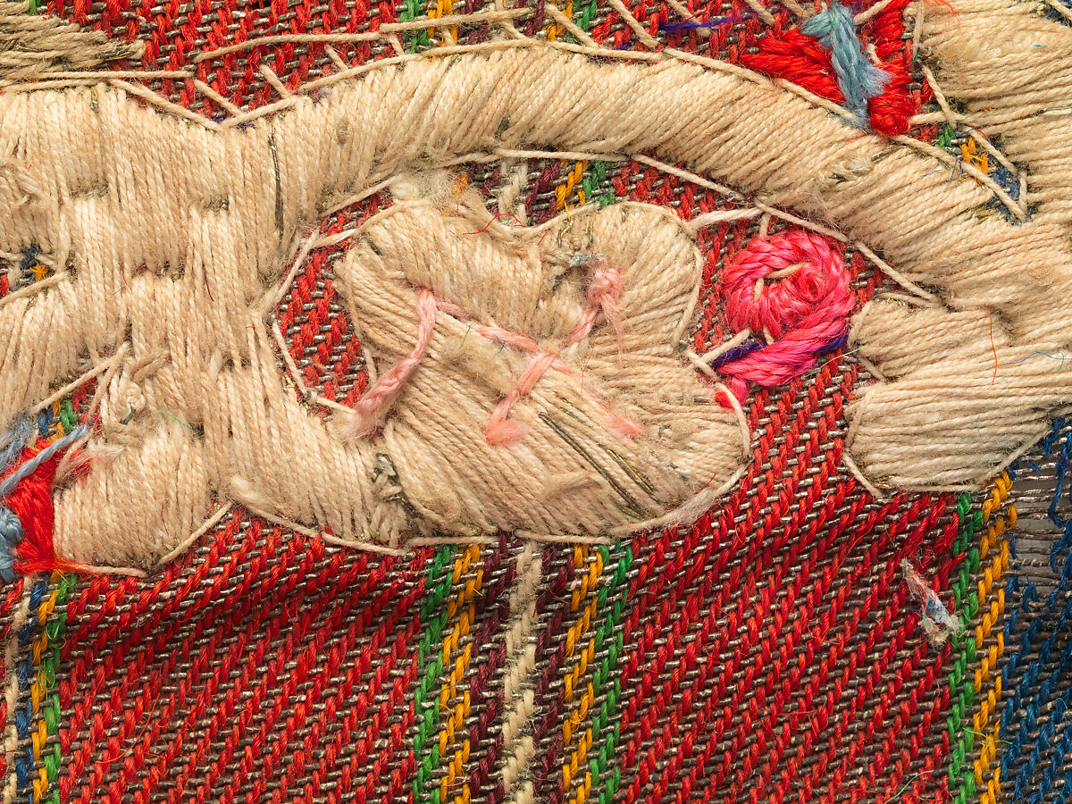 Fragment from an apron (opreg cu ciucuri), Background: twill weave (warp: Turcana wool, Z spun, 24 per cm; weft: metal-wrapped thread; wool, Z spun, 14 per cm; cotton, 2Z spun, S plied); decorative panel: tapestry weave (warp: cotton, 2Z spun, S pliz, 16 per cm; weft: linen, Z spun, 38 per cm; silk, 2Z spun, S plied; metal-wrapped thread, 64 per cm); embroidery: metal-wrapped thread, metal coil, Romanian, Banat area