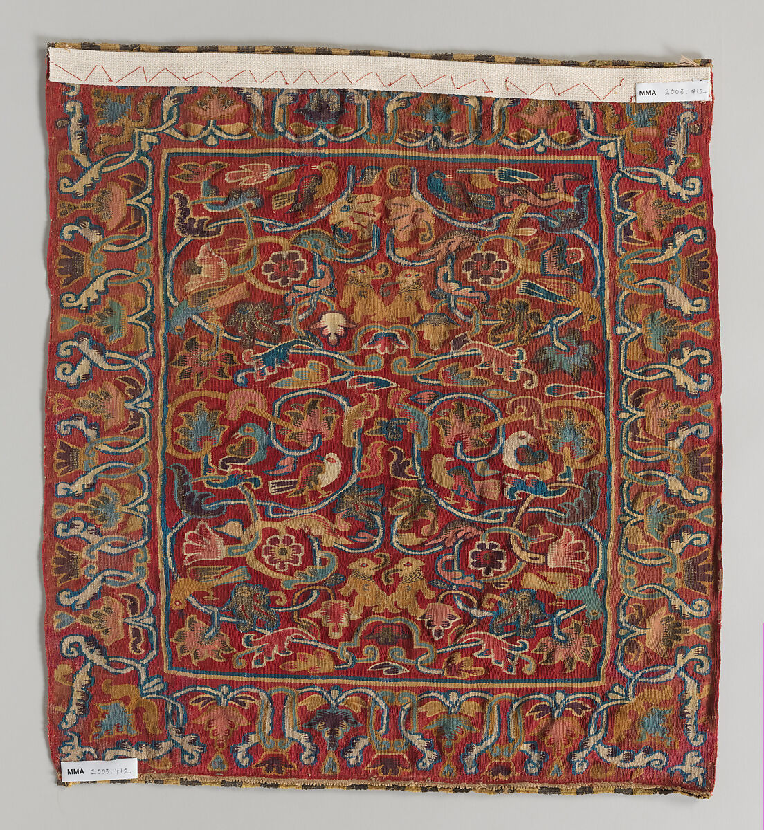 Seat cover, Tapestry weave, cotton warp and camelid hair, silver gilt, and silk weft, Peruvian