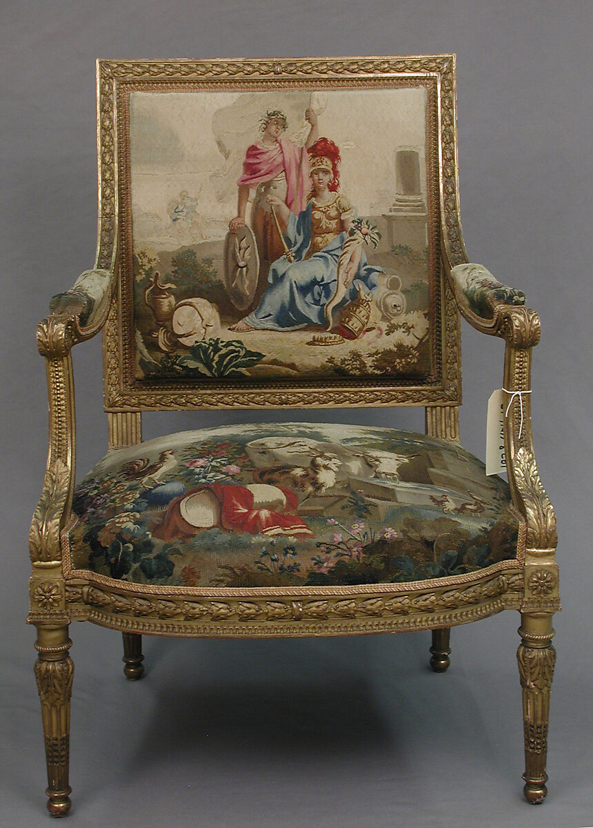 19th century French Louis XVI style arm chair with tapestry upholstery.