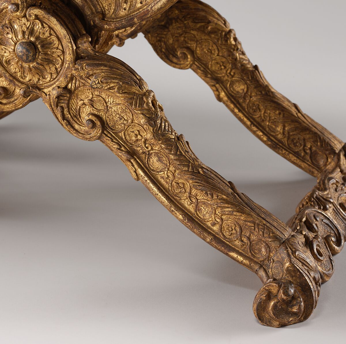 Folding stool (pliant) (one of a pair), Carved and gilded walnut; silk velvet with gold trim (not original), French, Paris