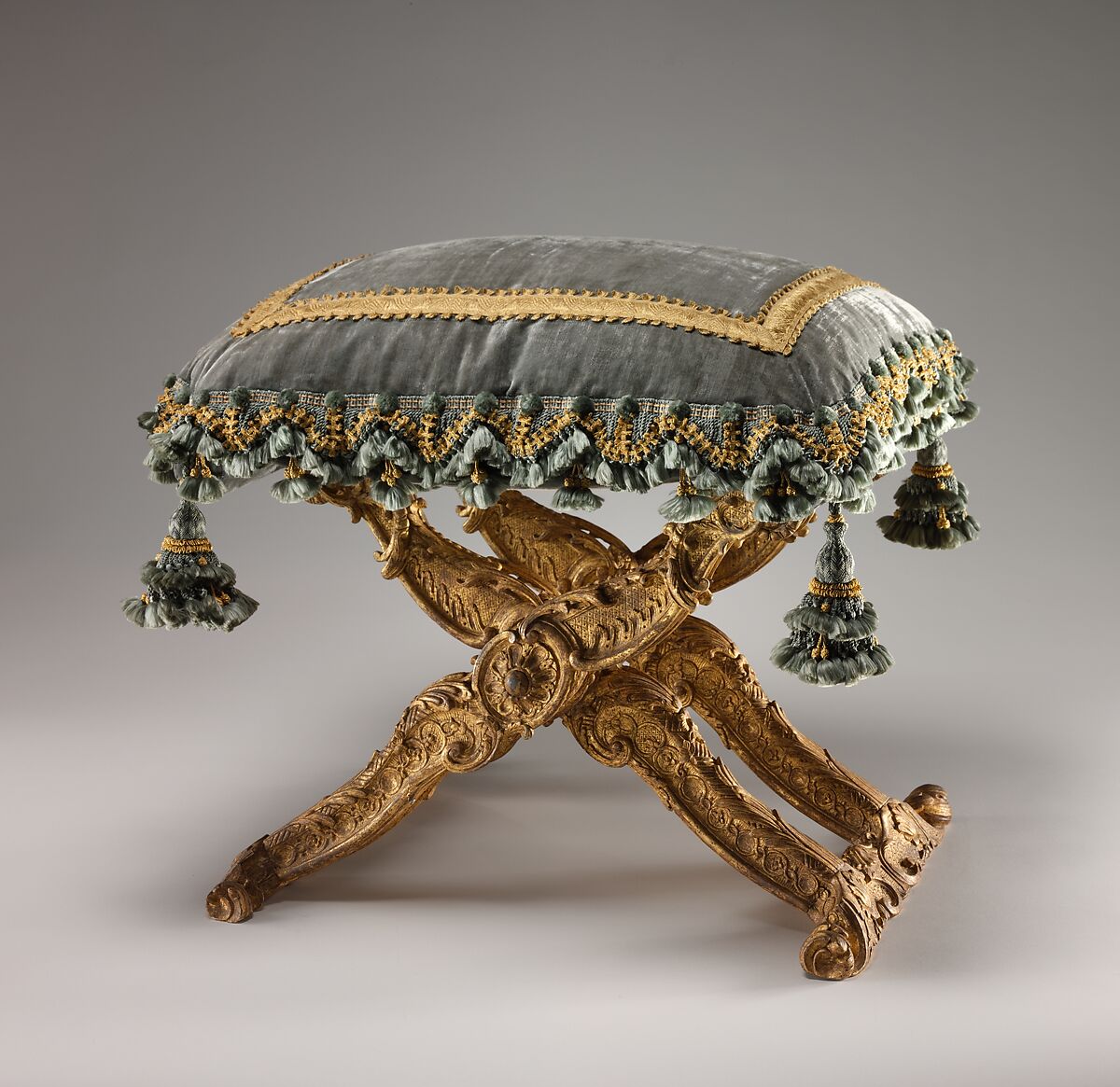 Folding stool (pliant) (one of a pair), Carved and gilded walnut; silk velvet with gold trim (not original), French, Paris