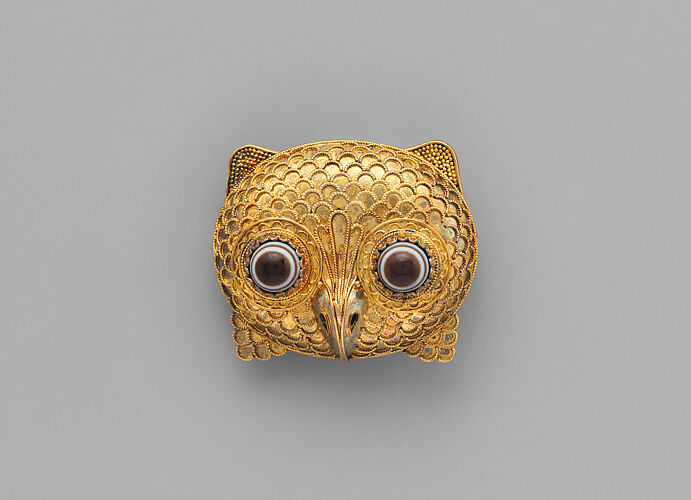Brooch in the form of an owl head