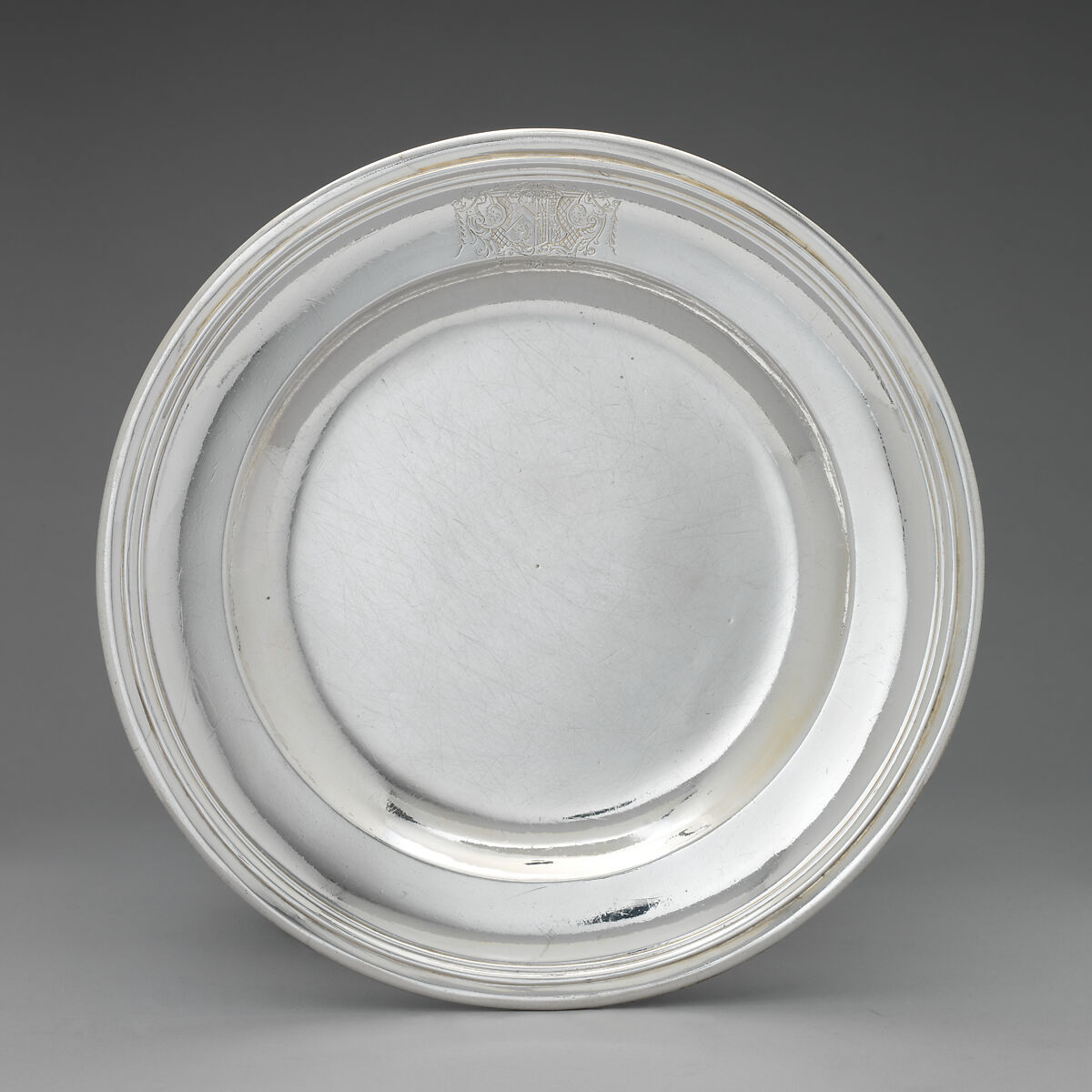 Plate (one of a set of twelve), Thomas Farren (British, active ca. 1707–d. 1743), Silver, British, London 