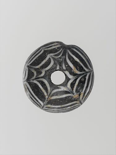 Glass spindle whorl