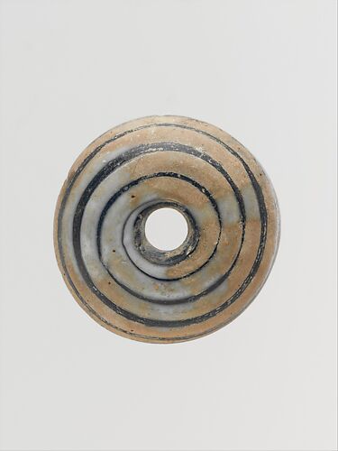Glass spindle whorl
