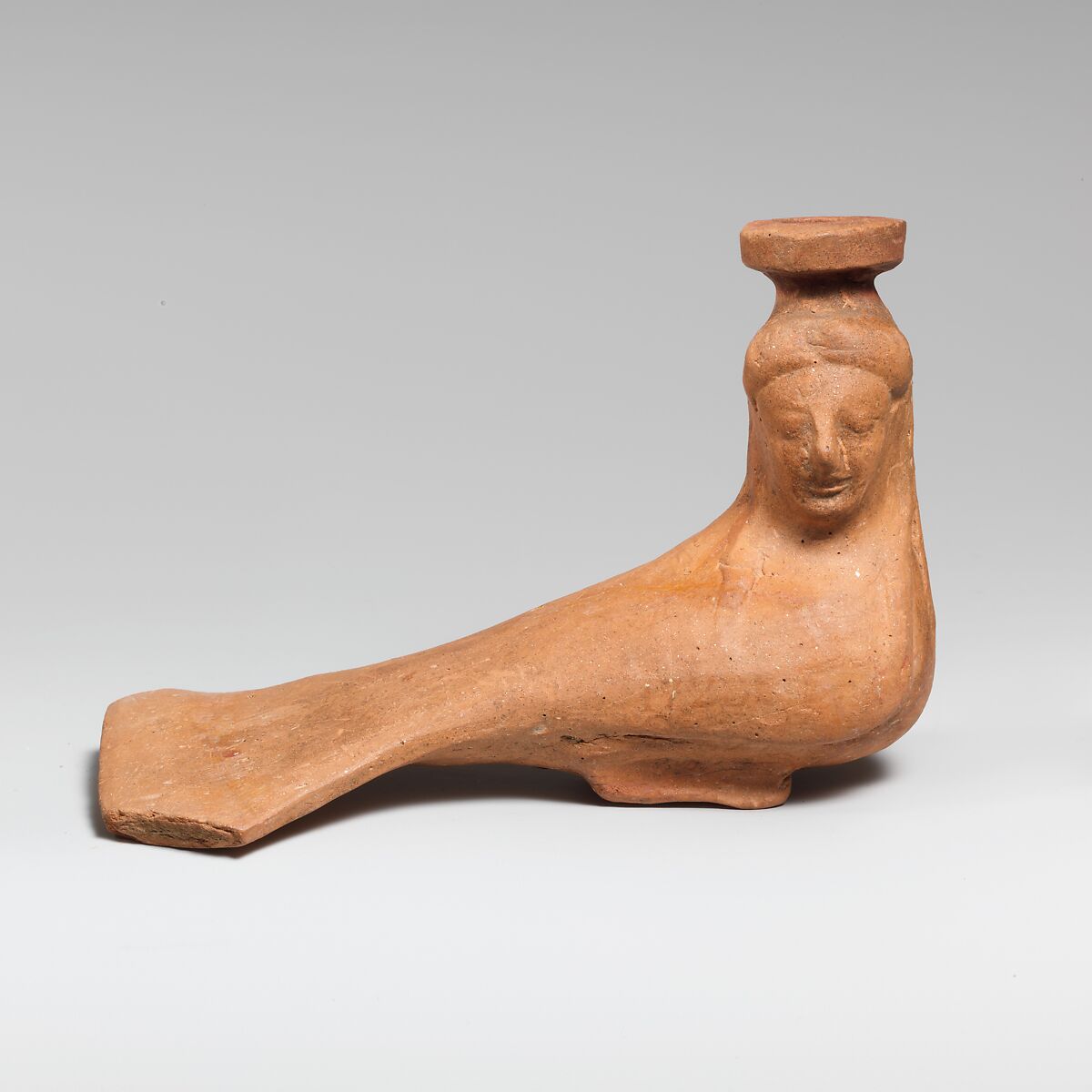 Terracotta vase in the form of a siren East Greek, Rhodian Archaic