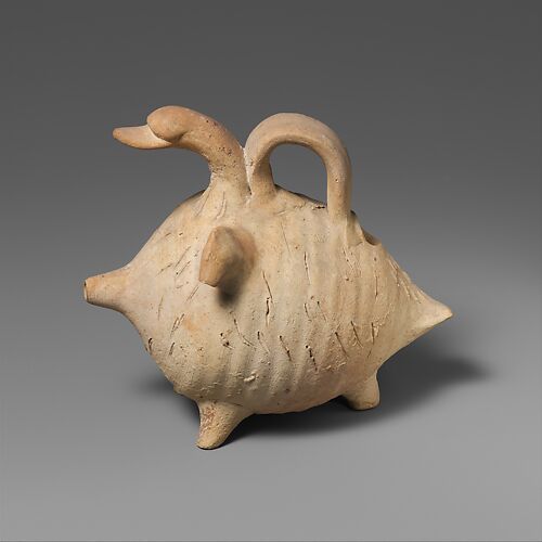 Terracotta duck-shaped askos (flask with spout and handle over the back)