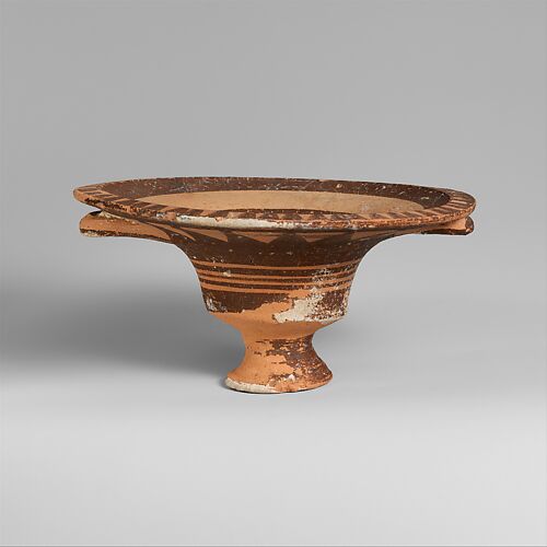 Terracotta stemmed dish with two handles